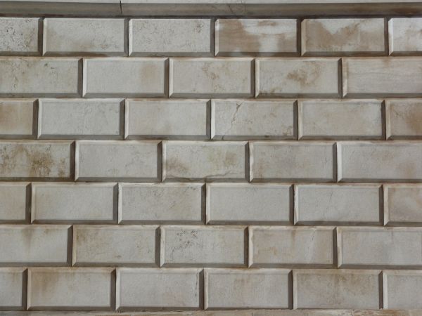 New grey stone set in even brick pattern.